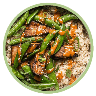 Brown Rice And Soy Marinated Tofu Bowls With Spicy Peanut Sauce