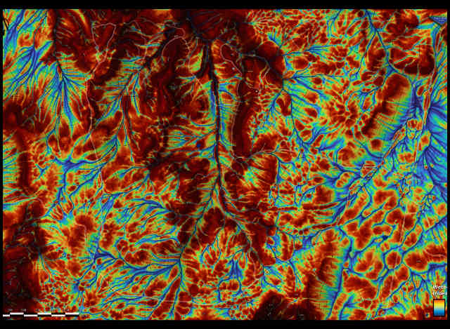 wetness index mapping, water accumulation analysis, drainage basin identification, moisture level mapping, color gradient wetness maps, GIS hydrology tools, optimal pond placement, rain garden planning, water flow and terrain, hydrological feature visualization