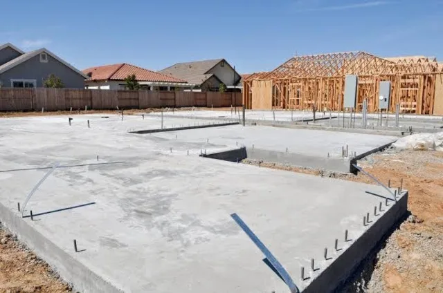 concrete slab, slab-on-grade flooring, finished concrete floor, durable classroom flooring, low-maintenance flooring, sustainable flooring material, concrete curing, thermal mass, green building floor, cost-effective flooring
